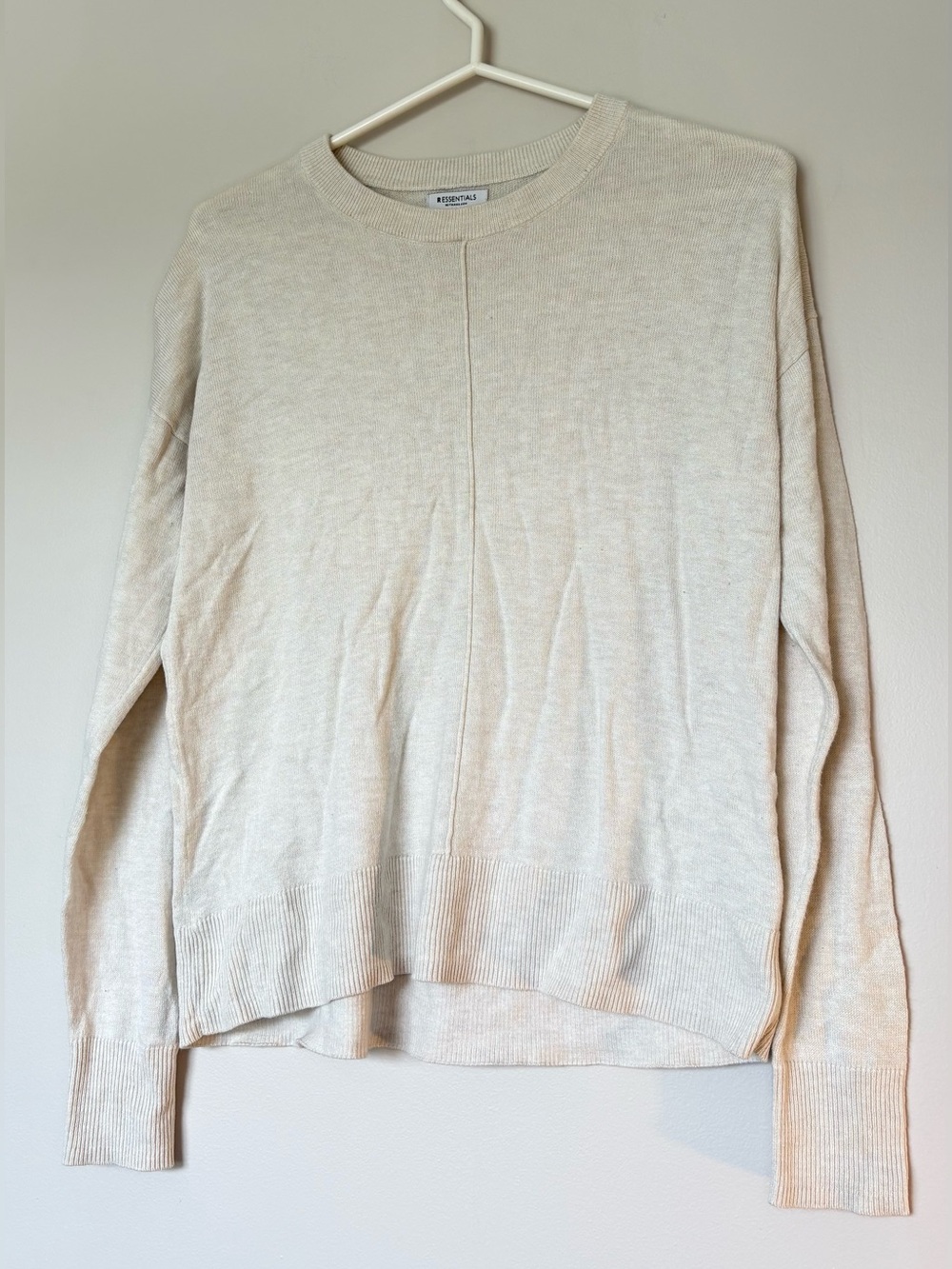 Essentials Women’s Cream Long Sleeve Crewneck Top